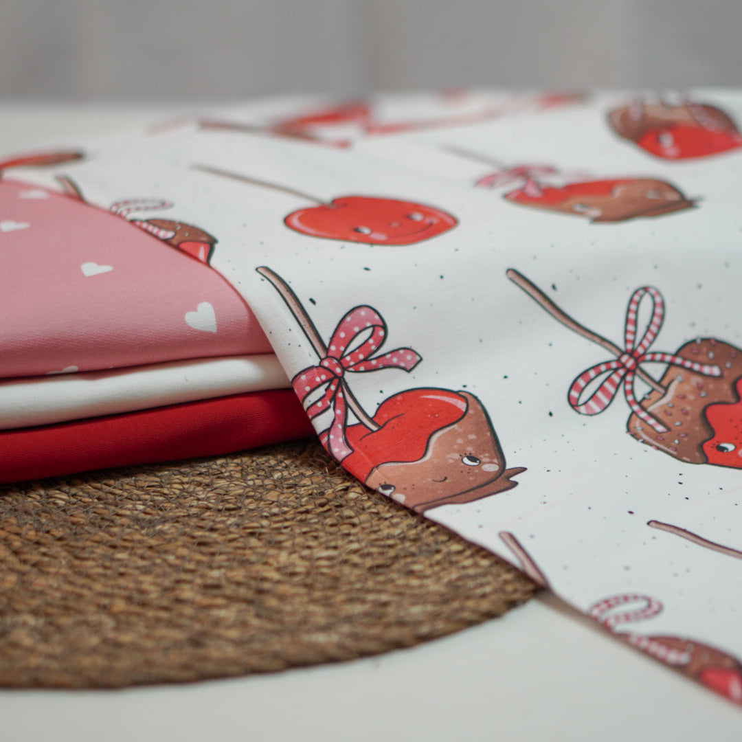 Kandierte Äpfel mit Gesichtern von Katzengold Design weihnachtsstoff