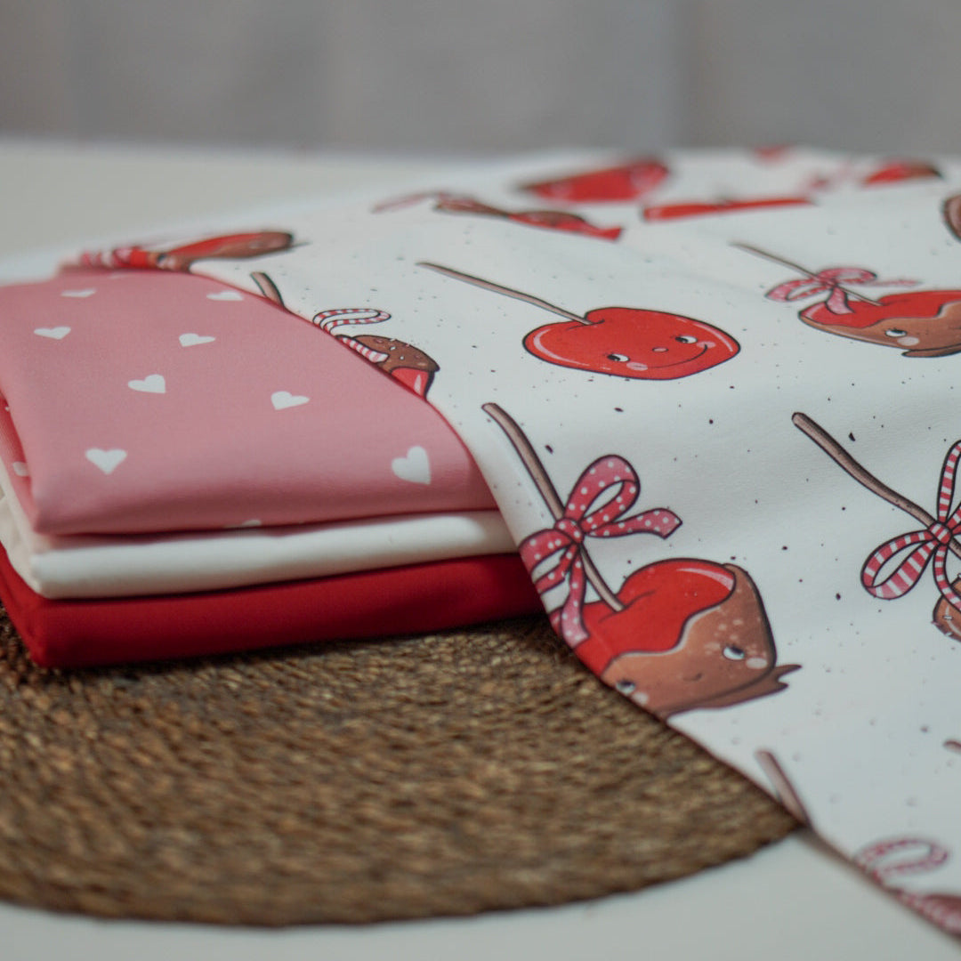 Kandierte Äpfel mit Gesichtern von Katzengold Design weihnachtsstoff