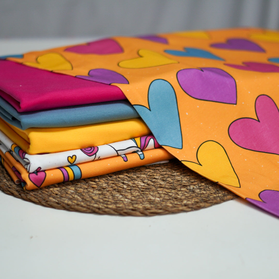 Kinderstoff Meterware bunte Herzchen auf gelb von Katzengold Design mit Kombistoffen