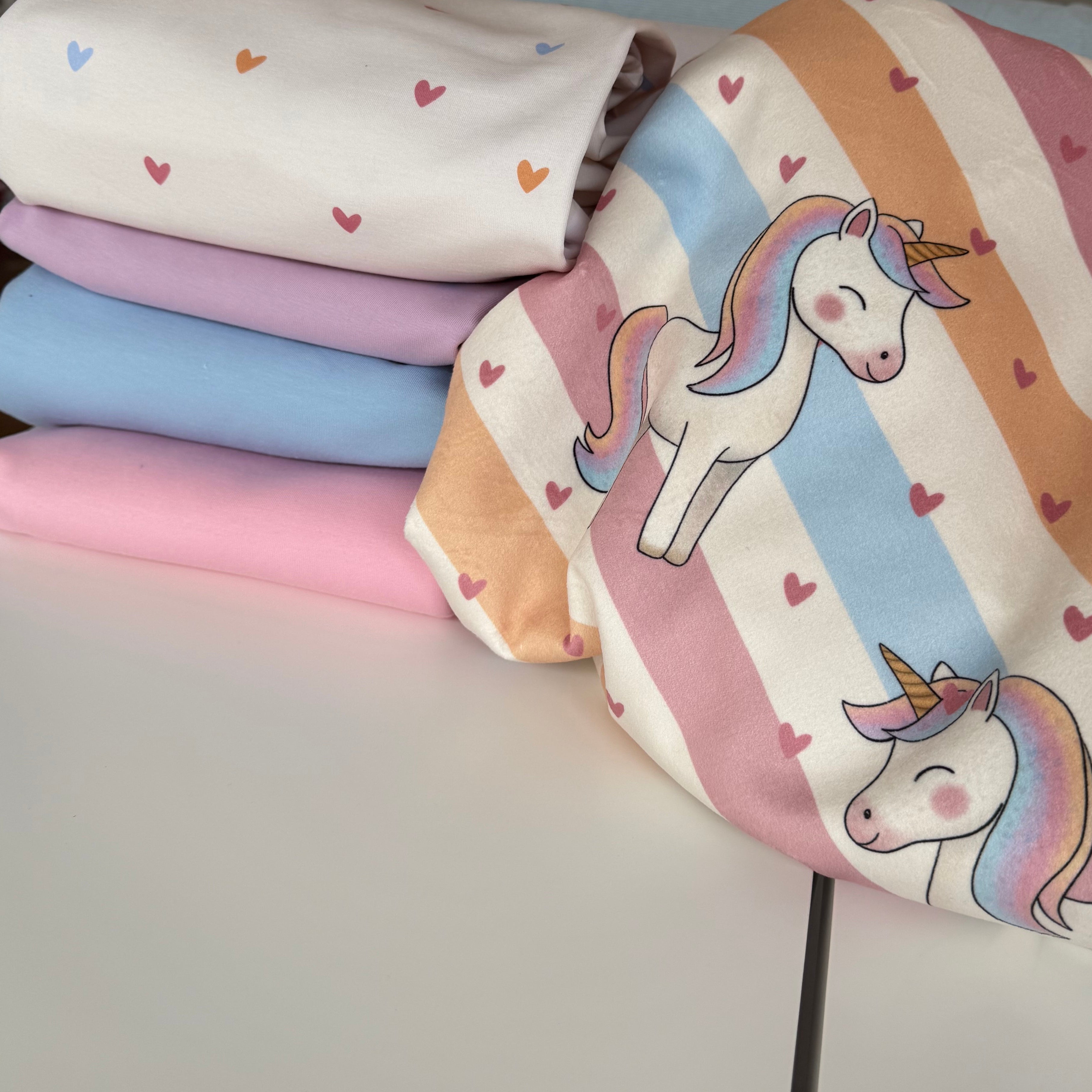 Bio French Terry "Pastell Einhorn"