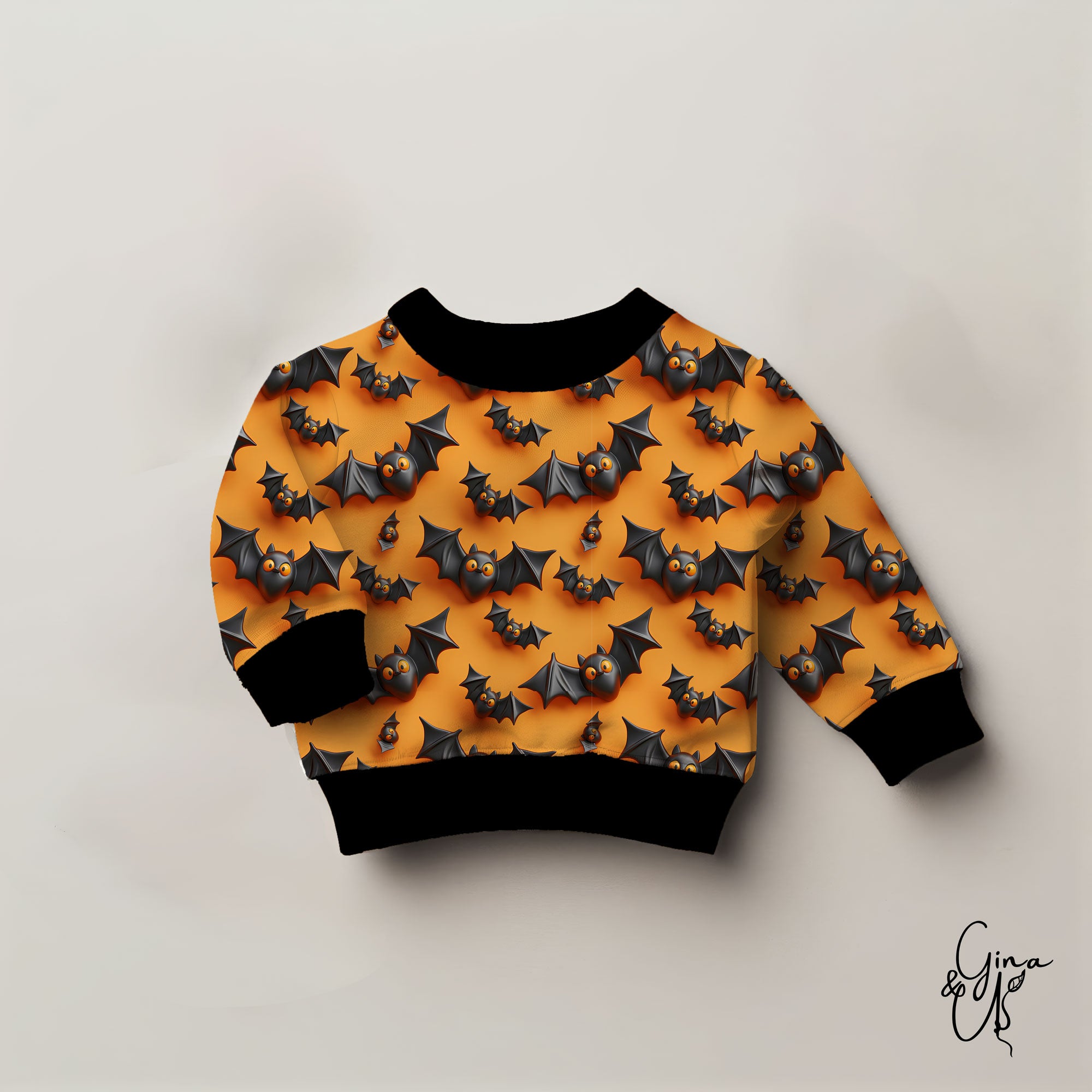 Kinderstoff Fledermüse in schwarz auf orange Halloween Meterware als Pullover