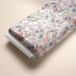 Kinderstoff mit süßen Einhörnern, Regebögen und Blumen von Katzengold Design