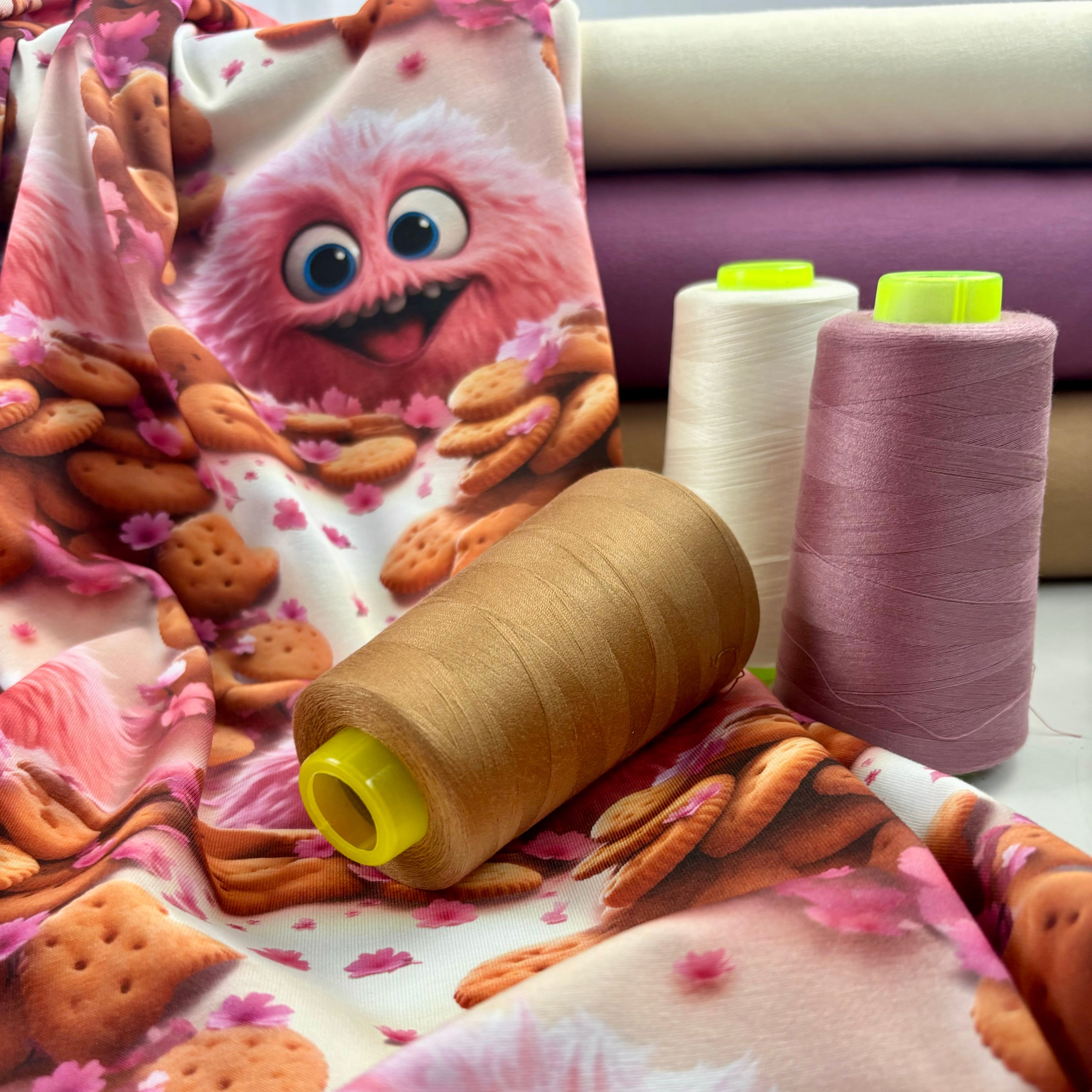 Kinderstoff rosa Monster mit Keksen und Blumen Keksmonster Kombistoffe