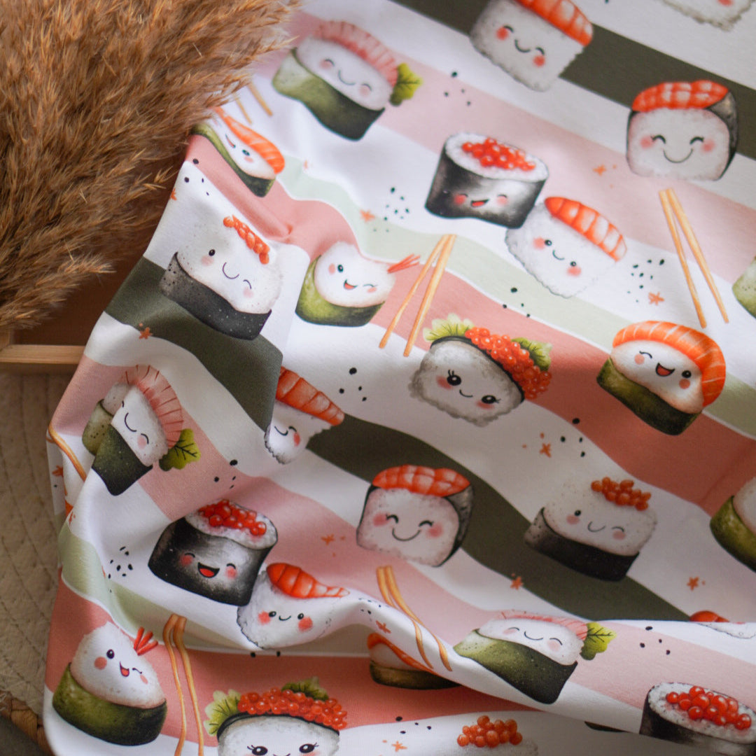 Kinderstoff mit fröhlichem Sushi mit Gesichtern