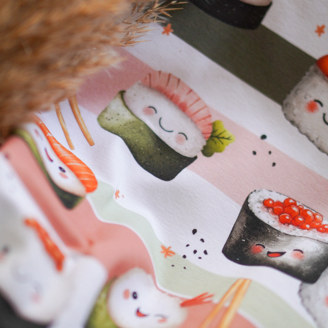 Kinderstoff mit fröhlichem Sushi mit Gesichtern