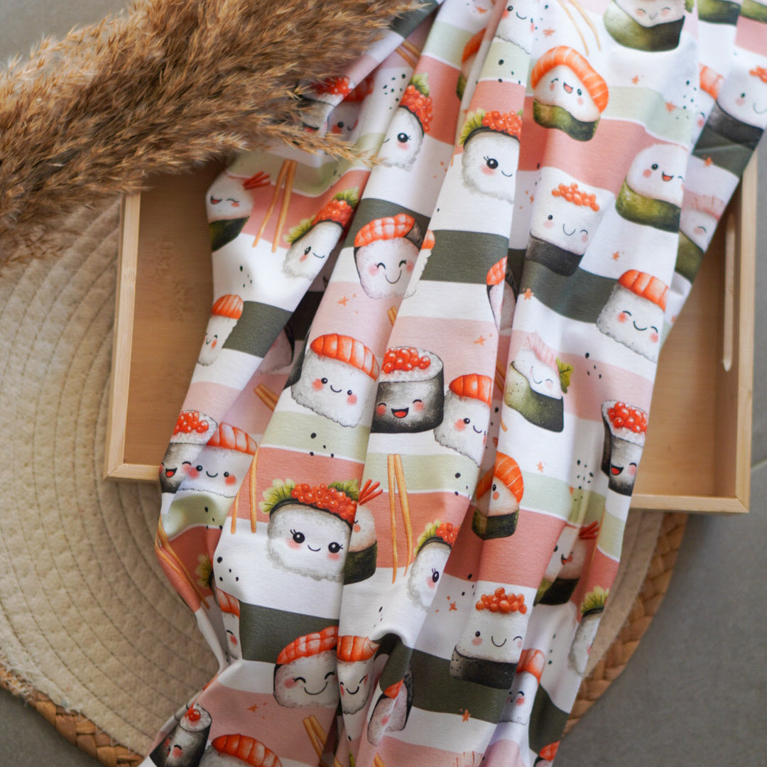Kinderstoff mit fröhlichem Sushi mit Gesichtern