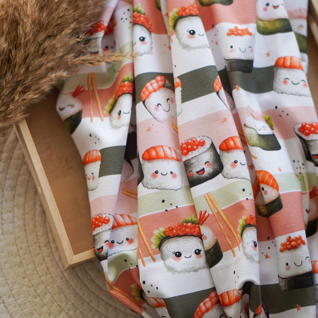 Kinderstoff mit fröhlichem Sushi mit Gesichtern