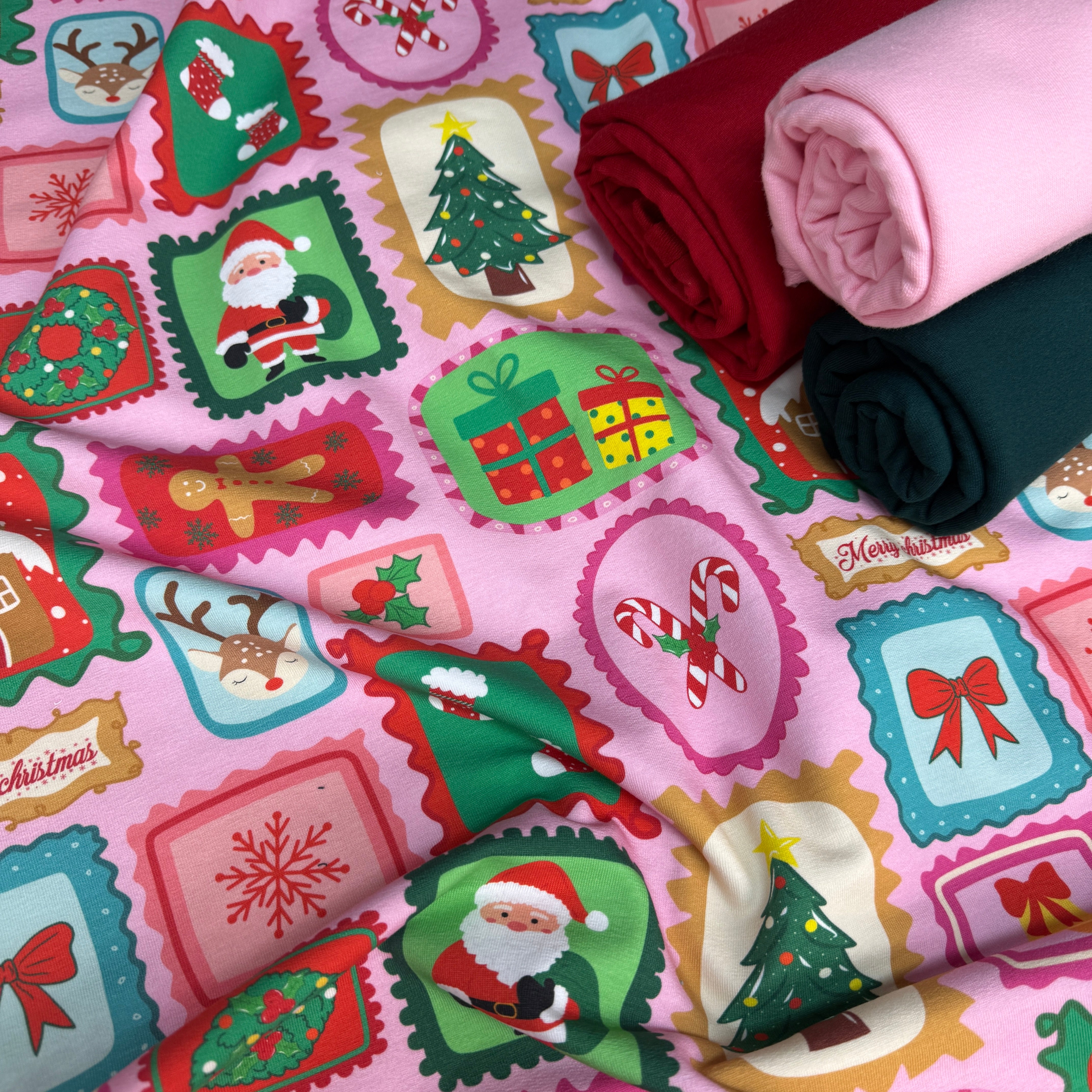 Stoffvorbestellung "Rosa Weihnachtsmarken im Zackenrand"