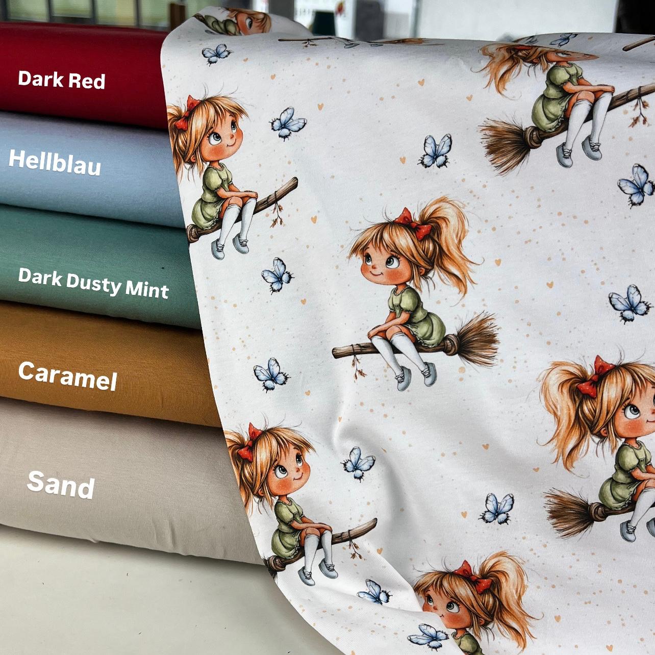 Kinderstoff Meterware Hexe auf Besen mit roter Schleife Hexenmädchen Schmetterlinge Kombistoffe